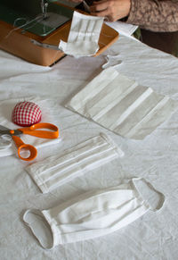 Low section of person with toy on table