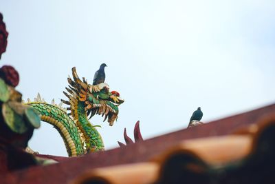 Low angle view of statue against clear sky