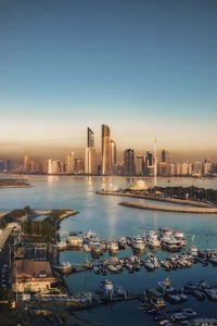 View of city buildings against sky in abu dhabi, uae