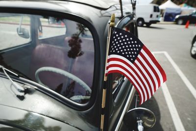 Close-up of flag on car