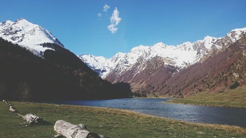 Scenic view of snowcapped mountains against sky