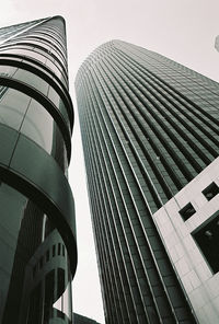 Low angle view of modern buildings against clear sky