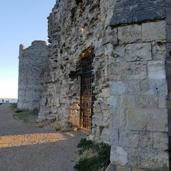 Low angle view of old building against clear sky