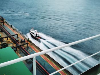 High angle view of ship sailing in sea