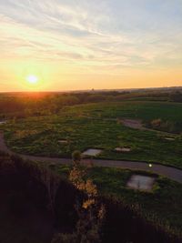 Scenic view of landscape at sunset