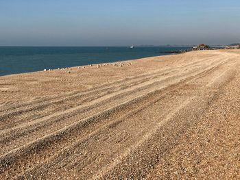 Scenic view of beach against sky