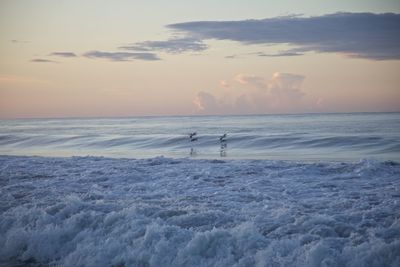 Scenic view of sea against sky during sunset