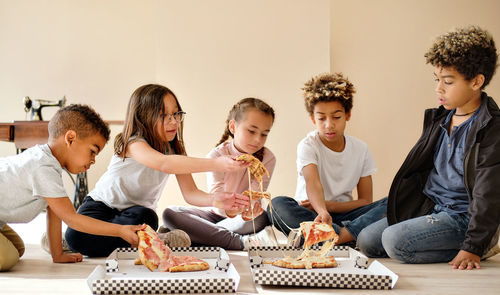 Friends sitting on table