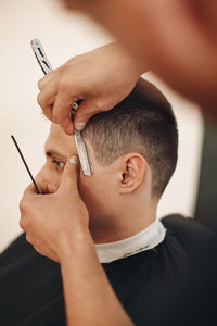 Midsection of man working at clinic