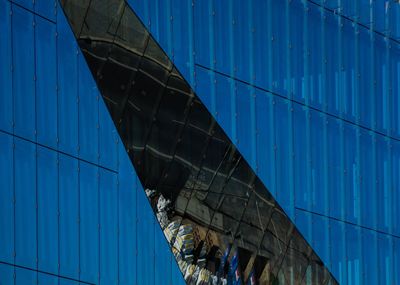 Low angle view of building against blue sky