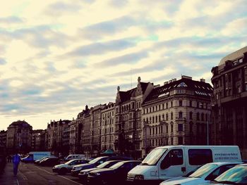 Buildings in city against sky