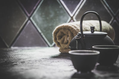 Close-up of tea pot on table