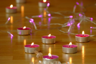 Close-up of lit tea light candles