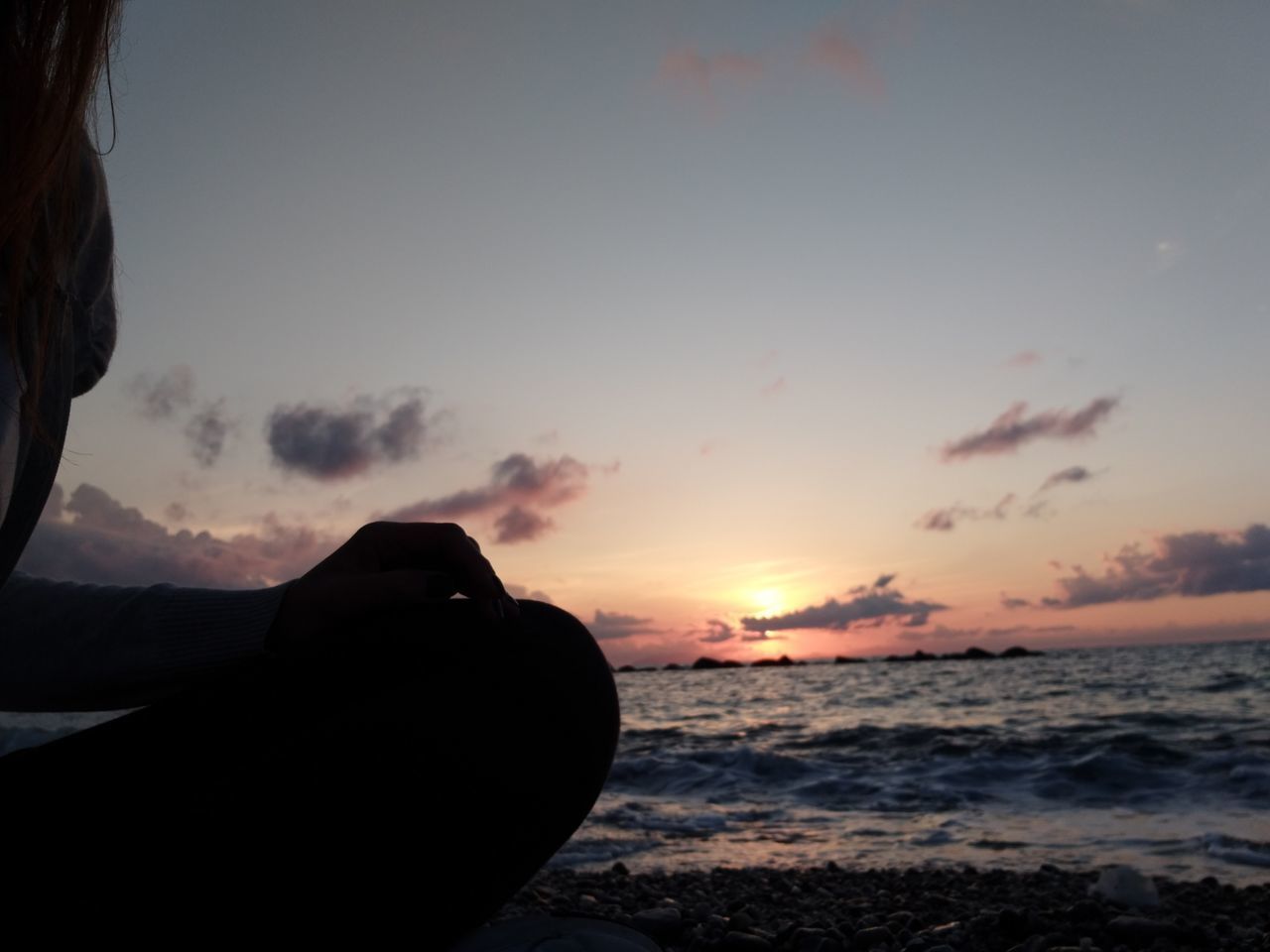 SCENIC VIEW OF SUNSET OVER BEACH