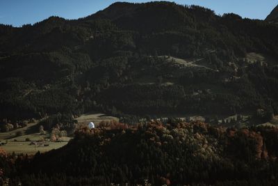 High angle view of trees and buildings against sky