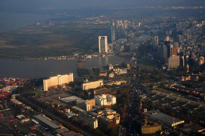 High angle view of buildings in city against sky