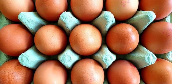 Full frame shot of eggs in container