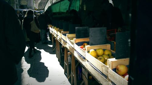 Group of people at market stall