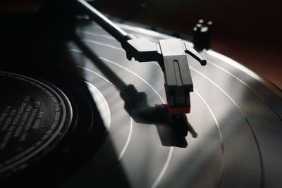 Close-up of turntable and record player needle