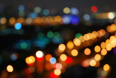 Defocused image of colorful illuminated lights at night