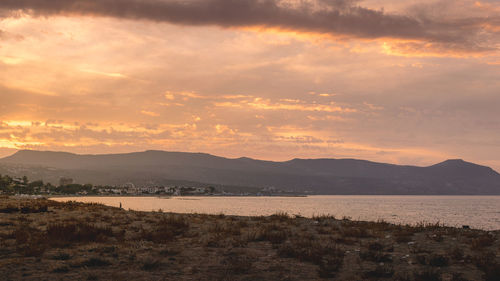 Scenic view of mountains against sky during sunset