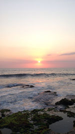 Scenic view of sea at sunset