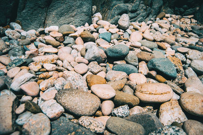 High angle view of stones on pebbles