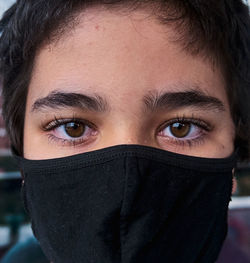 Brazilian boy using mask during the quarantine.