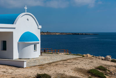 Scenic view of sea against blue sky