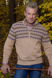 Portrait of smiling man standing outdoors