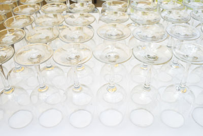 High angle view of wineglasses arranged on table