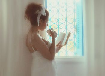 Close-up of woman standing in pond