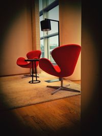 Close-up of red chairs