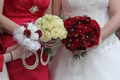 Close-up of hand holding bouquet