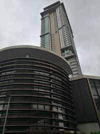 Low angle view of skyscraper against sky