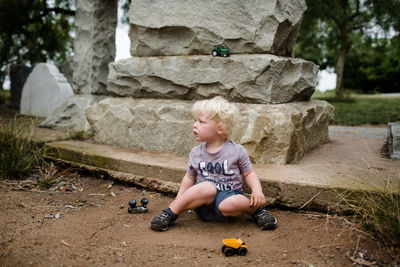 Cute boy playing with toy