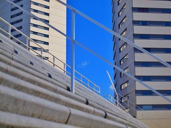 Staircase against buildings in city