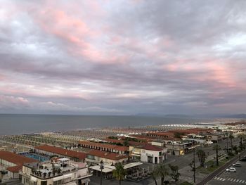 High angle view of buildings against sky during sunset