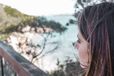 Woman looking at the beach 