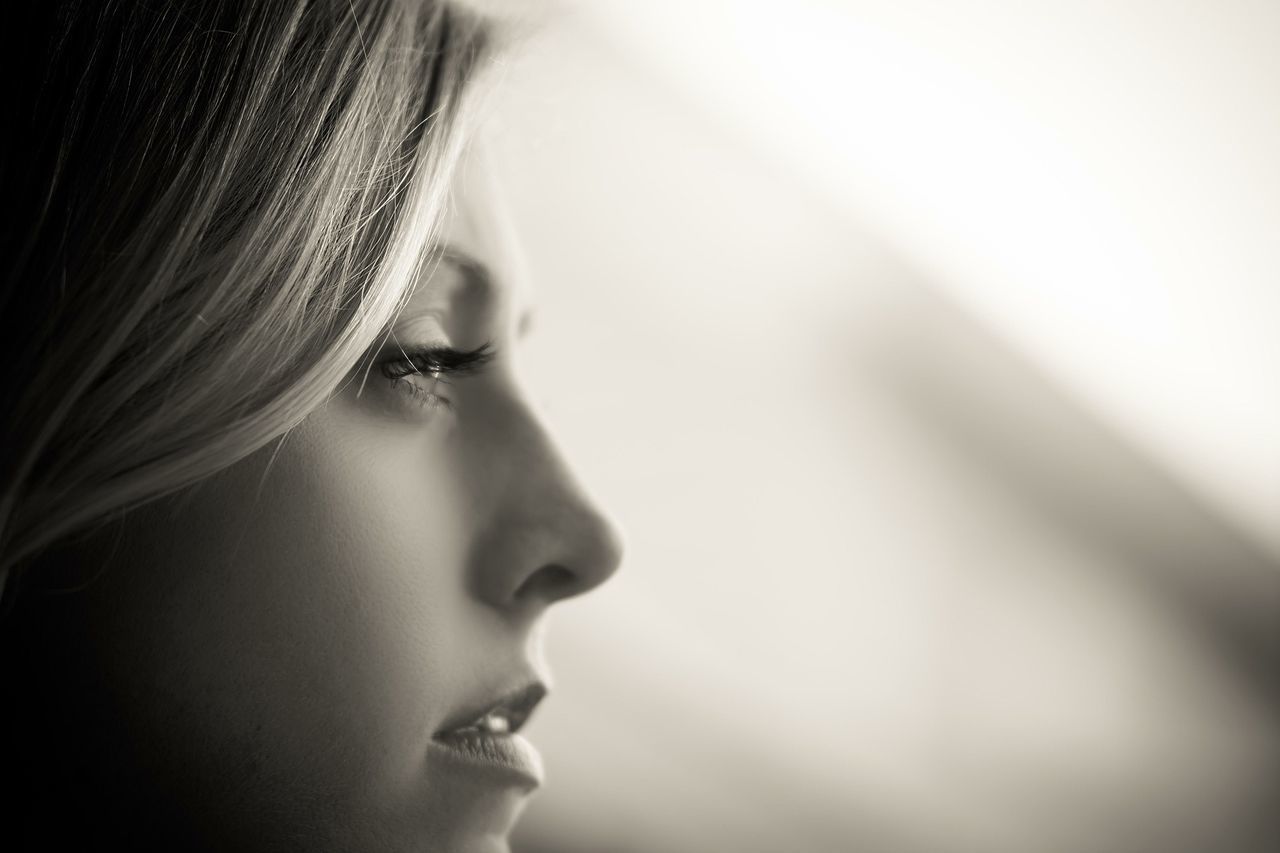 headshot, close-up, lifestyles, person, human face, young women, focus on foreground, contemplation, young adult, leisure activity, indoors, looking away, head and shoulders, side view, long hair, childhood, human hair