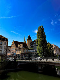 Bridge over river against sky