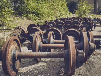 Close-up of old machinery on field