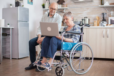 People sitting in laptop