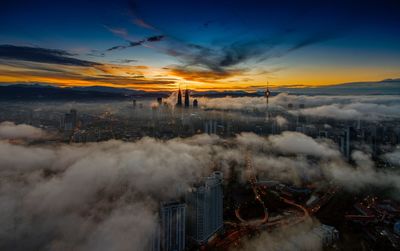 High angle view of kuala lumpur cityscape at sunset