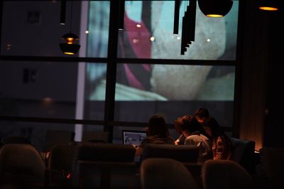 People sitting at home