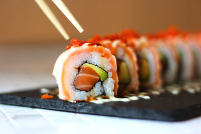 Close-up of sushi served in plate on table