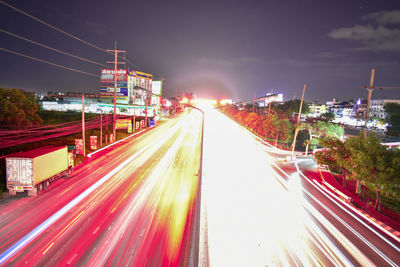 Light trails on city street at night