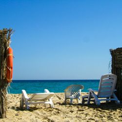 Scenic view of beach against clear sky