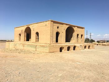 View of old ruins against blue sky