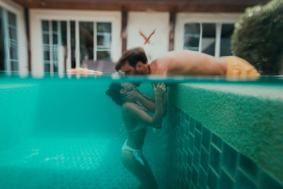 Woman swimming in pool